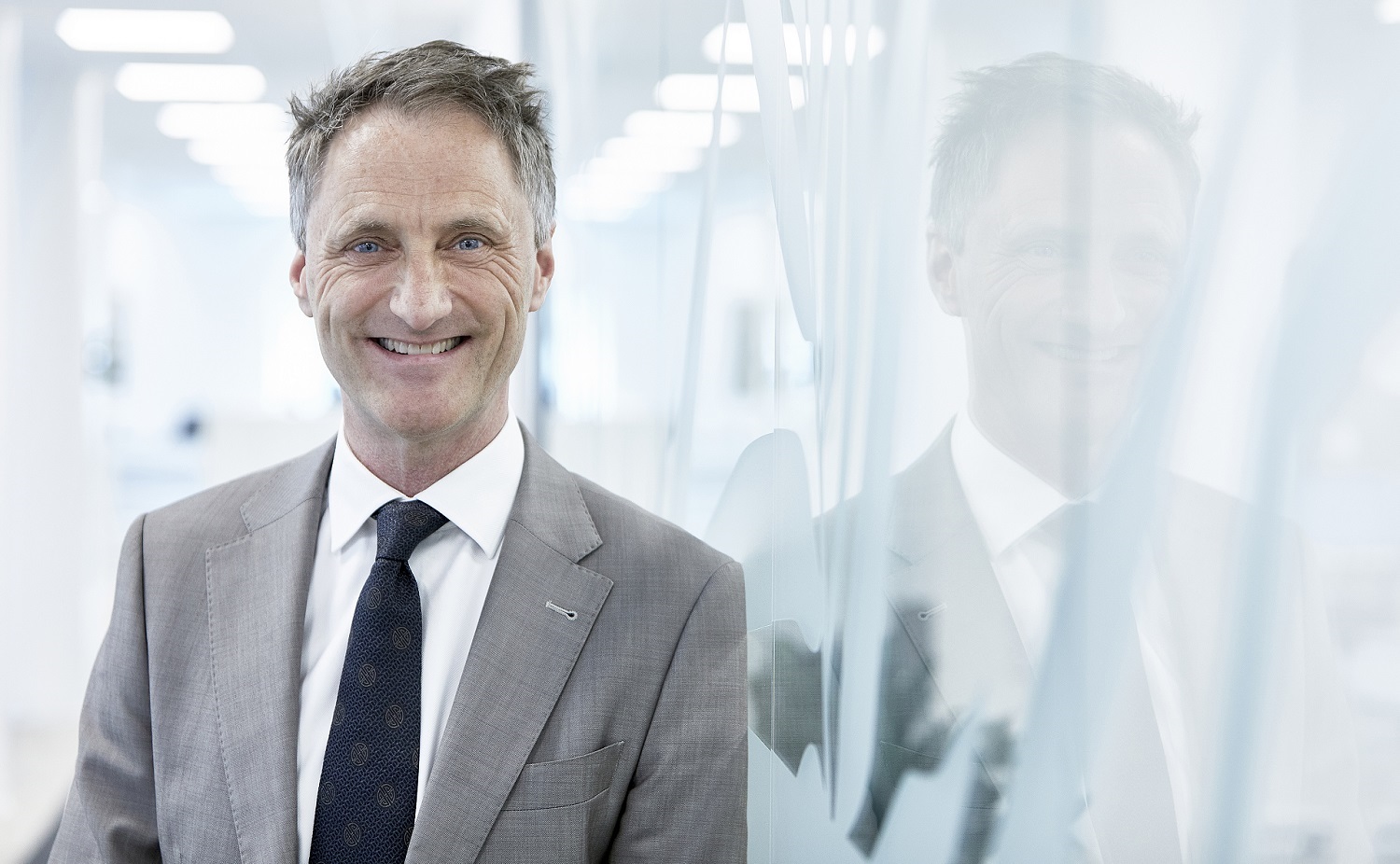 Investeringsdirektør og partner i Koncenton A/S, John Sloth, i gråt jakkesæt